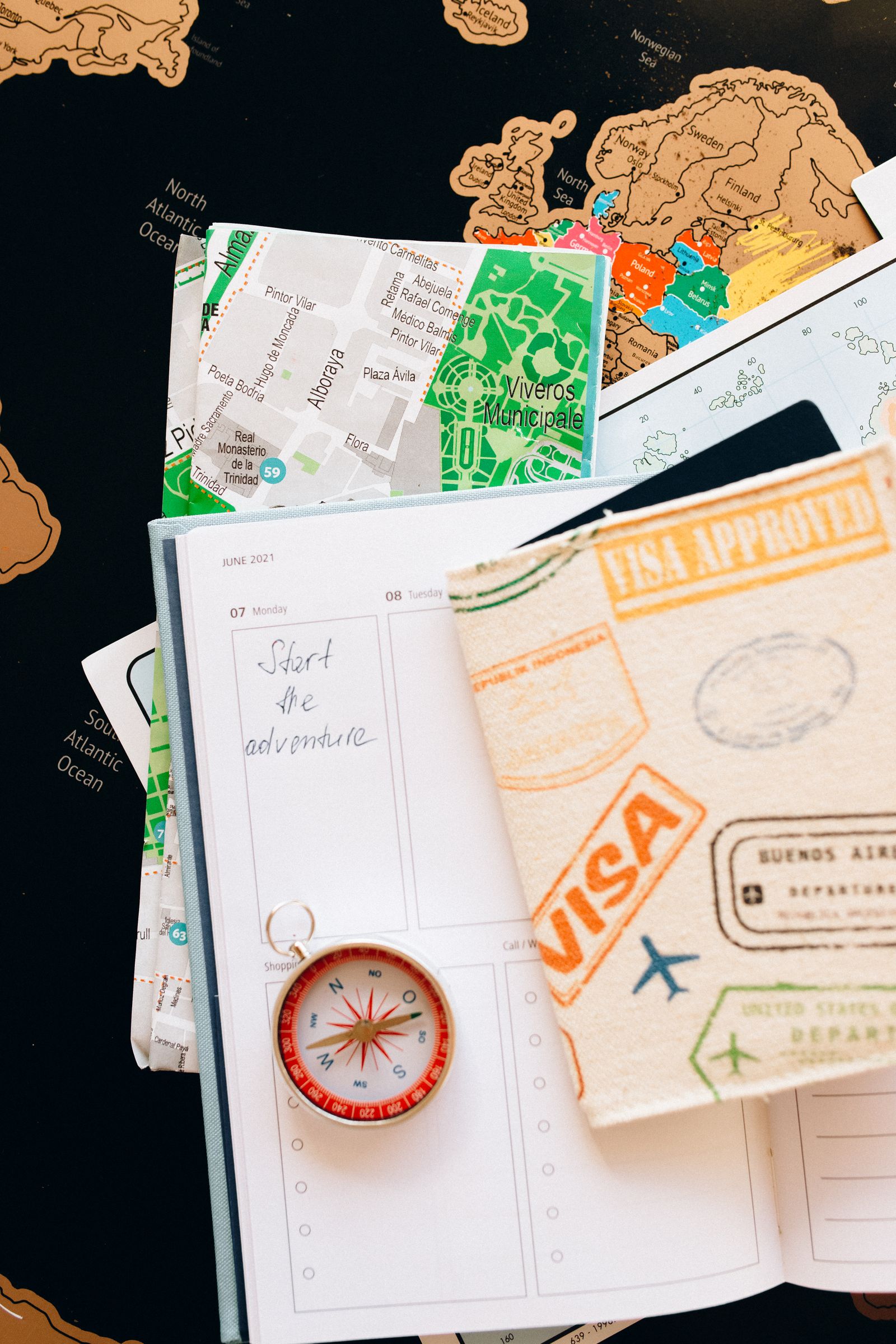 Travel planning notebook and map for an Ayurvedic trip to Kerala