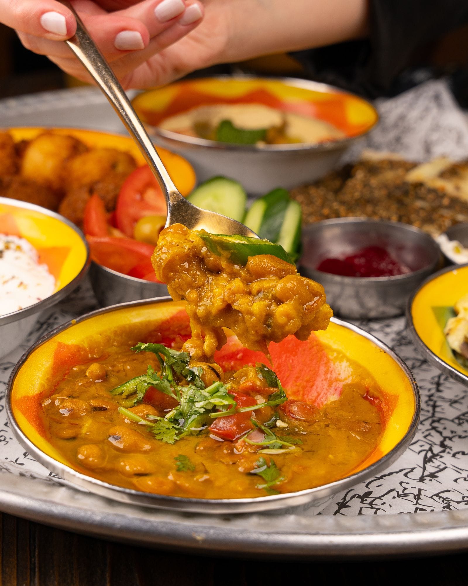 Warm lentil dish garnished with cilantro, similar to the kitchari eaten during Panchakarma